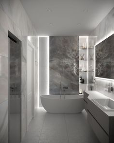 a bathroom with a large bathtub and two sinks in the center, along with mirrors on the wall