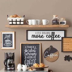 there are coffee signs and other items on the wall in this room, along with some drinks