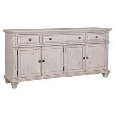 an old white dresser with drawers and knobs on the doors is isolated against a white background