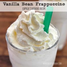 vanilla bean frappecino in a glass with whipped cream on top