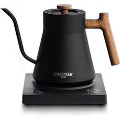 a black stove top with a wooden handle on it's side and the words politar next to it