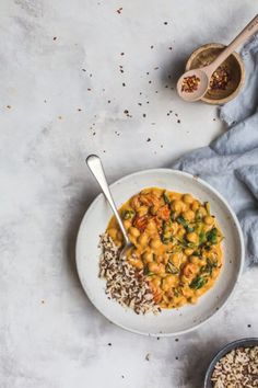 a white bowl filled with beans and rice