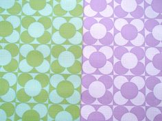 two different colored fabric designs with circles on them, one in green and the other in purple