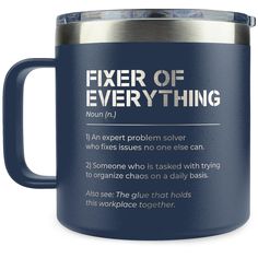 a blue coffee mug with the words fixer of everything on it, and an image of