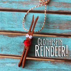 clothespin reindeer ornament hanging on wood planks with text overlay that reads, clothespin reindeer