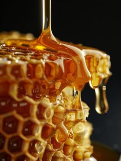 honey flowing down from the top of a beehive, creating an intricate pattern