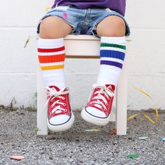 Start your child's journey of self-discovery with a celebration of his or her uniqueness with colorful, fun and bright tube socks! These white retro tube socks are approximately 10 inches and are made to fit BABIES, TODDLERS and KIDS. Expect them to be: -thigh-high for infants -over-the-knee for toddlers 1 to 3 years old -knee-high for kids 3 to 5 years old Our tube socks are made of 75% Ring Spun Cotton, 14% Nylon, 7% Acrylic, 4% Spandex and proudly made in the USA! Pride Socks, Striped Tube Socks, Mismatched Socks, Toddler Converse, Goth Fashion Punk, Emo Dresses, Thigh High Boots Heels, Toddler Socks, Thigh High Socks