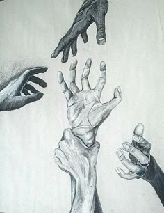 several hands reaching up towards each other to grab something out of the palm of someone's hand