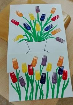 an art project for kids with hand prints and flowers