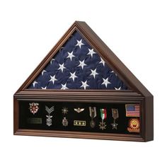 an american flag and medal display case is shown with medals on the bottom half of it