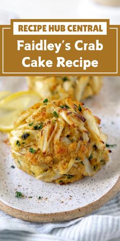 crab cakes on a plate with lemon wedges in the background and text overlay that reads recipe hub central fiddley's crab cake recipe