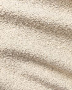 the texture of a white blanket is shown