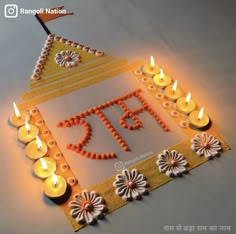 a cake with candles on it and the words happy diwal