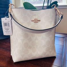 Questions? Leave A Comment Below! Coach Signature Mollie Bucket Bag Ca582. Nwt $398. Product Details Signature Coated Canvas And Smooth Leather Center Zip Compartment Snap Closure Detachable Handle With 6 3/4" Drop Detachable Strap With 22" Drop For Shoulder Or Crossbody Wear 8" (L) X 8 1/2" (H) X 4" (W) Style No. Ca582 Luxury White Bucket Bag With Double Handle, Designer White Bucket Bag For Travel, Designer White Bucket Bag For Everyday Use, Designer White Bucket Bag, Luxury White Bags For Errands, White Crossbody Bucket Bag For On-the-go, White Rectangular Shoulder Bag With Dust Bag, Designer White Bucket Shoulder Bag, Luxury White Bucket Bag For Shopping