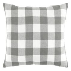 a gray and white checkered pillow on a white background