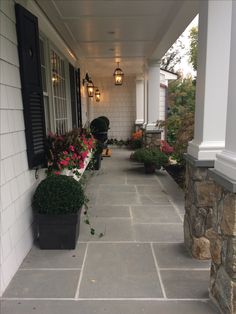 the front porch is clean and ready for us to use as an entrance way into the house