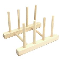 wooden pegs are arranged in the shape of a square with four poles on each side