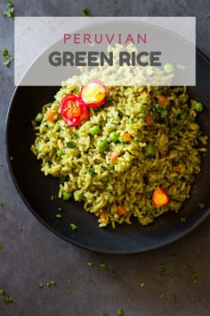 a black plate topped with green rice and veggies