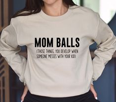 "Mom Balls Sweatshirt, Mom Hoodie, Gift for Mom, Funny Sweater, Mom Life Sweatshirt, Funny Sweater for Mom, Mothers Day Sweater 🔷 HOW TO PLACE YOUR ORDER? 🔷 Please be sure to carefully review the size, color, and design options provided in this listing. ✅ Select your desired size and shirt color from the available menus. ✅ Fill in the customization box with your preferred design color. You can refer to the listing photos to see the color choices. ✅ Choose the quantity you wish to purchase. ✅ C Funny Mom Sweatshirt, Mom Sweaters, Funny Sweater, Sassy Shirts, Design Shirts, Mom Sweater, Funny Sweaters, Mom Funny, Custom Design Shirts