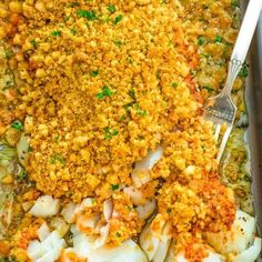 a casserole dish with meat, vegetables and bread crumbs on top