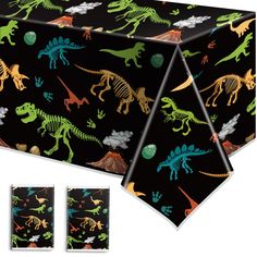 a table cloth with dinosaurs on it