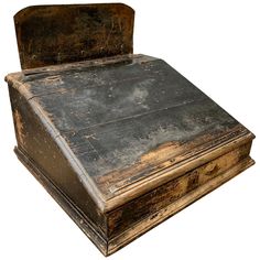 an old wooden bed frame with rusted paint on the top and bottom, against a white background