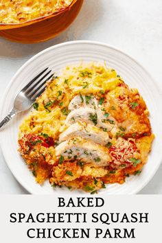 baked spaghetti squash chicken parm on a white plate