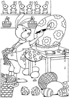 the easter bunny is decorating an egg