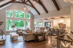 a living room filled with furniture and a fire place