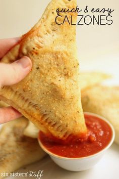 a hand dipping sauce onto some food in a small white bowl with the words quick and easy calzonees on it