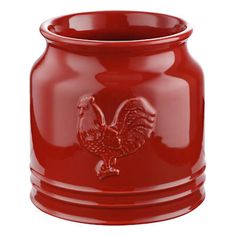 a red vase with a rooster design on the front and bottom, sitting in front of a white background