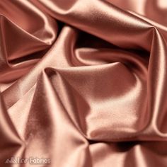 Description Add style and charm to your look with this Casino Shiny Rose Gold Spandex 4 Way Stretch Satin Fabric offering you the freedom to order exactly what you need for your next project. Rose Gold Casino Shiny Spandex 4 Way Stretch Satin Fabric Its 4-way stretch capability adds to its versatility. This means the fabric can stretch both horizontally and vertically, as well as diagonally, allowing for a comfortable and flexible fit in garments. Its stretch makes it suitable for clothing items Satin Material Fabrics, Ganpati Decor, Rose Gold Fabric, Fabric For Dresses, Rose Gold Satin, Stretch Satin Fabric, Wholesale Roses, Fabric Roses, Gold Satin