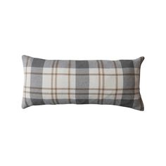 a gray and white plaid pillow on a white background