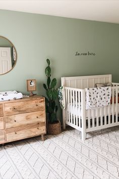 Gender neutral nursery Inso Gender Neutral Nursery Plants, Best Gender Neutral Nursery Paint Colors, Nursery Room Colors Neutral, Beige And Green Nursery, Green Theme Nursery, Nursery Ideas Neutral Green, Green Girl Nursery Ideas, Green Baby Nursery Boy, Desert Nursery Boy