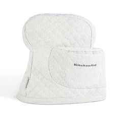 a baby's hat with the word kitchen in black and white stripes on it