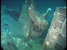 an underwater view of some old ships in the water