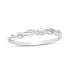 a white gold ring with diamonds on it