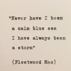 an old typewriter with the words'never have i been a calm blue sea i have always been a storm '