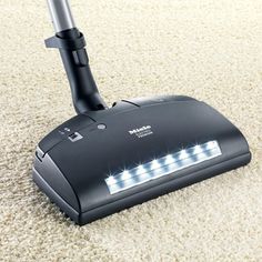 a close up of a vacuum cleaner on the floor