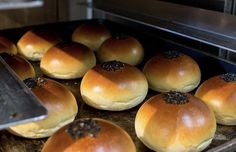 buns are being cooked in an oven