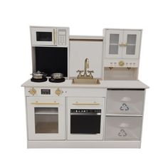 a toy kitchen with white cabinets and appliances