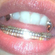 Discovered by kiana. Find images and videos about fashion, gold and cyber ghetto on We Heart It - the app to get lost in what you love. Grillz For Females, Girls With Grills, Girl Grillz, Grillz Teeth, Diamond Grillz, Gold Grill, Brace Face, Gold Grillz, Boujee Aesthetic