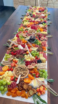 a long table covered in lots of different types of food