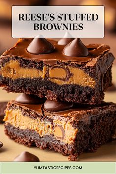 reese's stuffed brownies stacked on top of each other with chocolate and peanut butter