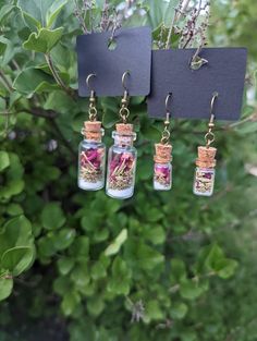 Two different sizes but the same ingredients. Salt, thyme, rosemary, rose petals, and a clove to keep away those negative energies. Protection Spell Jar, Jar Earrings, Earring Inspo, Protection Spell, Spell Jar, Protection Spells, Rose Petals, Thyme, Rosemary