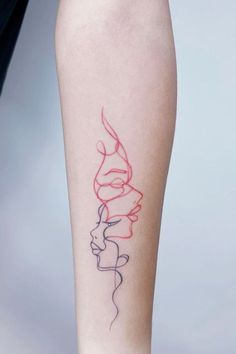 a woman's leg with a red line drawing on the left side of her arm