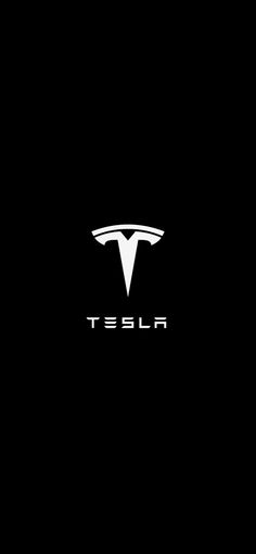 the tesla logo on a black background