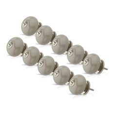 six pairs of silver knobs on a white background with clipping for each one