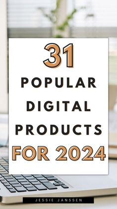 a white sign that says 31 popular digital products for 2014 on top of a laptop