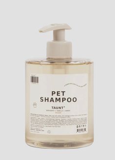 a bottle of pet shampoo on a white background